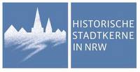 Das Bild zeigt das Logo der Arbeitsgemeinschaft historische Stadtkerne NRW