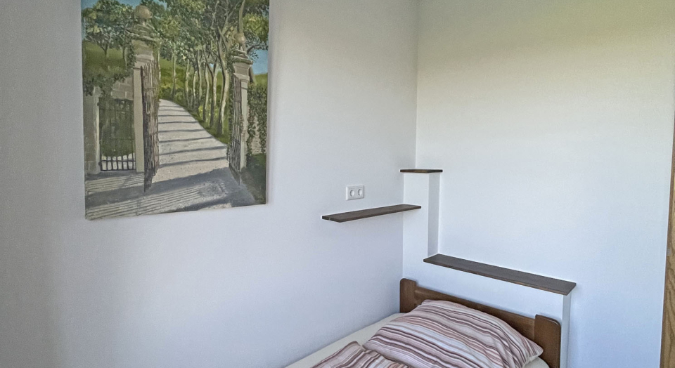 Das Foto zeigt ein Schlafzimmer der Unterkunft "Beimannskath".